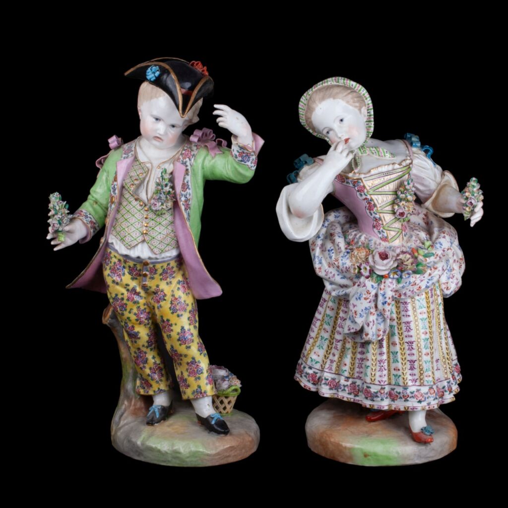 Colossal and graceful pair of Meissen-style porcelain figurines